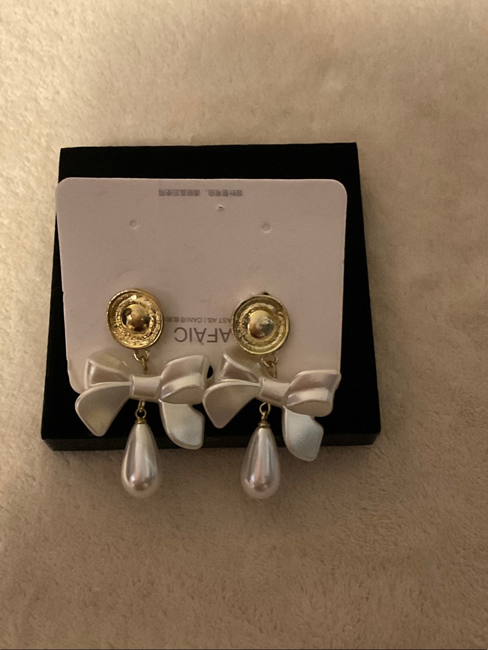 Gold-Tone Bow Earrings with White Pearl Teardrops